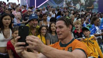 Michael Hooper is enjoying life as a sevens player, having scored his first try in the short format. (AP PHOTO)