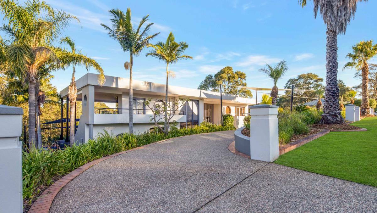The price of a three-level Catalina home has been reduced. Picture by Ray White Batemans Bay