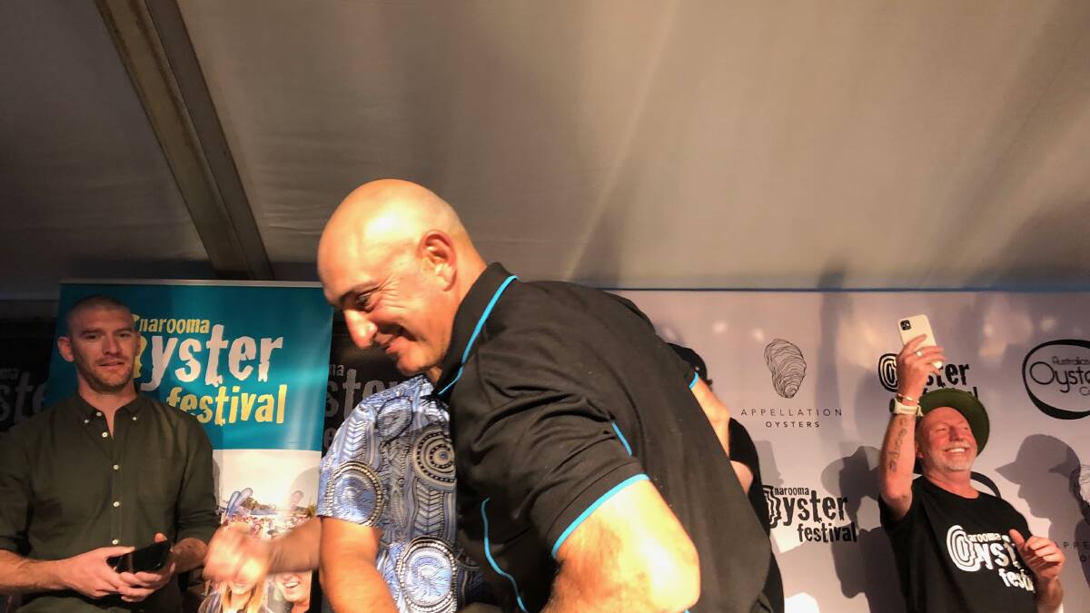 Jim Yiannaros of Batemans Bay Oysters won the oyster shucking competition at Narooma Oyster Festival last year and trained this year's winner Gerard Doody Dennis. Picture by Marion Williams.