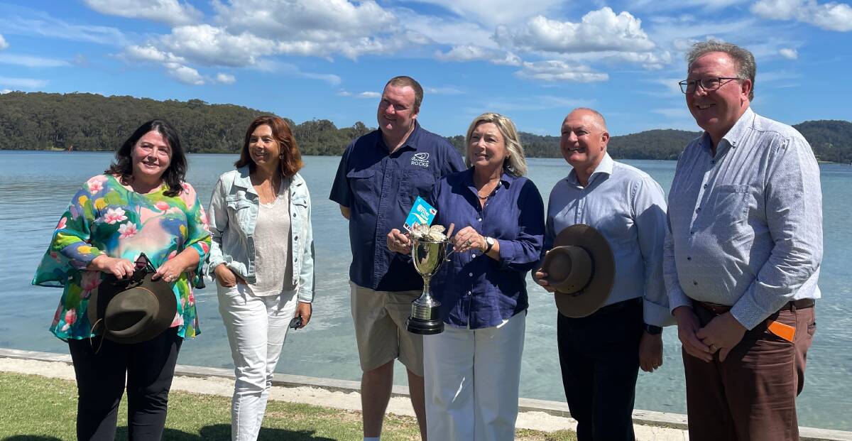 Members of the Narooma Rocks committee with Cath Peachey, David Harris MP and Dr Michael Holland MP at the announcement of the $600,000 funding commitment. Picture by Marion Williams.