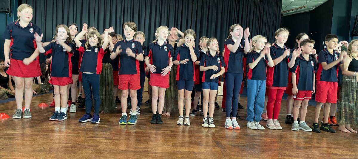 Year 3 and Year 4 pupils at Narooma Public School chanted the words to a welcome to country for Narooma VIEW Club's 45th birthday luncheon on Friday, June 23. Picture by Marion Williams.