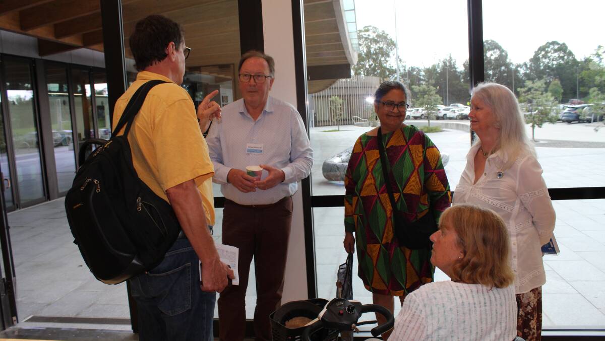 Member for Bega Dr Michael Holland speaking with Arno Schaaf from South Coast Health and Sustainability Alliance and CWA Tilba branch members Helene Sharpe, Nola Ezzy and Vicky Stadon at the Bus Industry Taskforce Bus Passengers Forum in Batemans Bay on Friday, February 23. Picture by Dr Holland's office