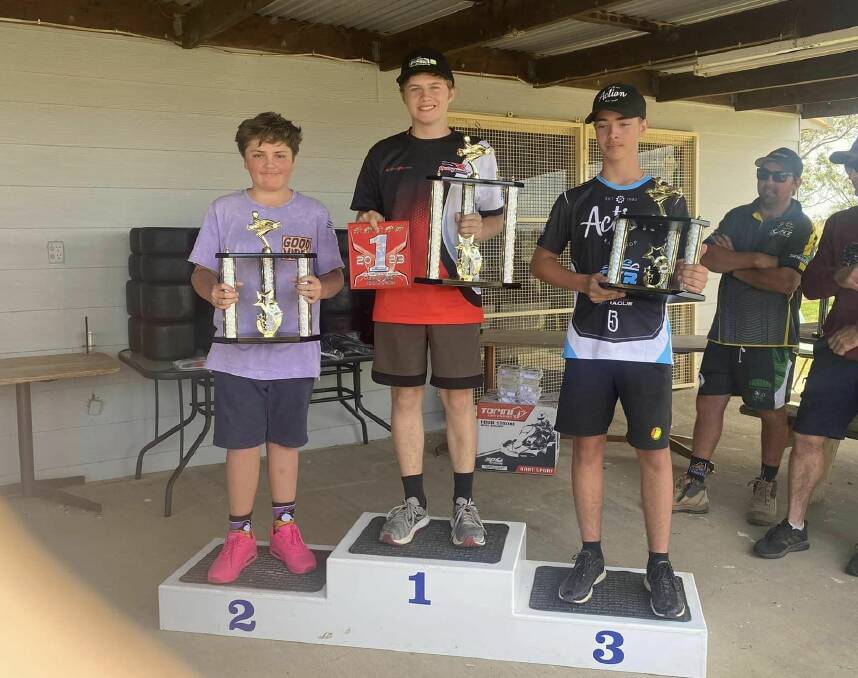 From left: George Miles, Aidan Williams and Hunter Hague celebrate their podium wins at the Wagga Kart Racing Club on October 21 and 22. Picture supplied