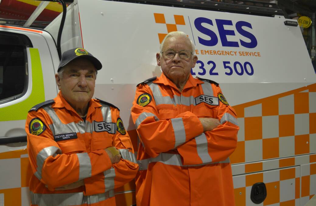 Honorary lifetime members of Moruya SES Trevor Bennett (left) and Jeff Ganderton have together marked 50 years' service in the volunteer-run organisation.