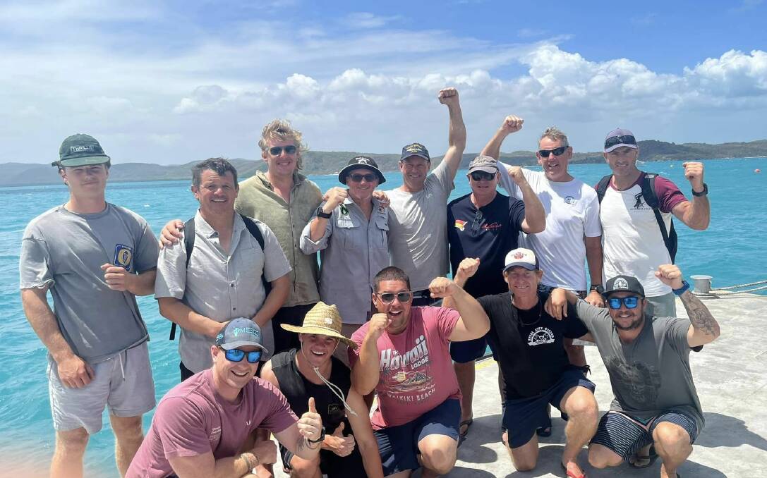 The MusselRowers crew were all smiles when they reached the wharf at Thursday Island after their 200-kilometre journey. Picture by Robert Pollock