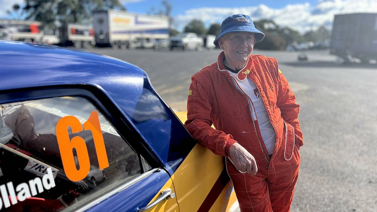 Gwyn Mulholland, 78, leaning on Geoff Boyd's rally car. Picture by James Parker