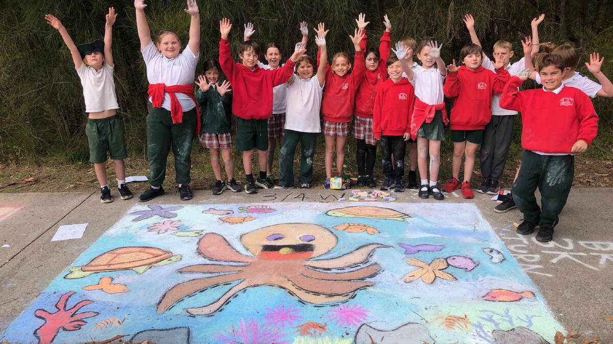 3/4 W complete with chalky hands, celebrate their completed NAIDOC work. Picture supplied.
