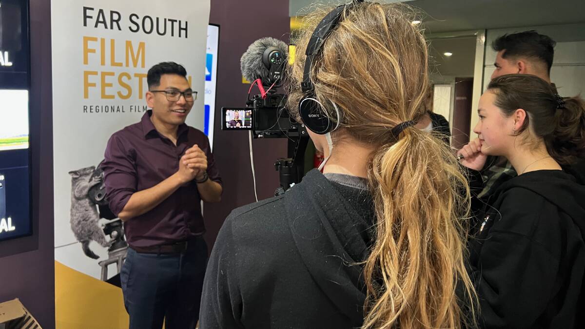 Festival youth media team Alfie Tait and Anise Yi interview Canberra filmmaker Ujjwal Rai at the 2023 Far South Film Festival. Picture by Hiromi Matsuoka