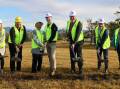 NSW Premier Chris Minns (centre) turns the first sod on the Eurobodalla Regional Hospital project, July 12, 2024. Picture supplied