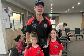 Steve Fitzgerald and his daughters celebrate his 350th first grade game with the Batemans Bay Boars. Picture supplied